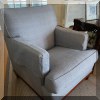 F05. Pair of blue club chairs with chevron patterned upholstery. 